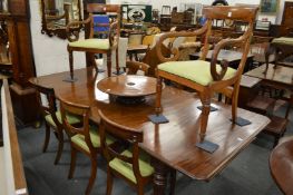 A good William IV mahogany extending dining table with two leaves on carved and turned legs.
