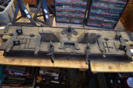 A large and unusual piece of oak with numerous items of wrought iron work attached, reputedly