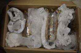 A quantity of gilt decorated glass lampshades.