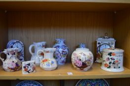 A quantity of Mason's and similar china to include two mantle clocks.