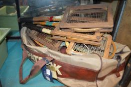 A holdall containing old tennis racquets etc.