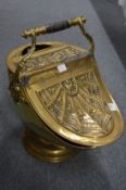A good Victorian embossed brass coal box.