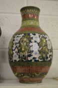 A large continental pottery vase.
