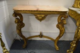 A giltwood and marble top pier table.