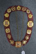 A gilt metal chain of honour with enamel decoration.