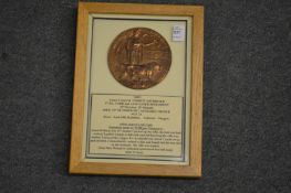 A framed and glazed WW1 bronze memorial plaque or 