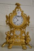 A gilt spelter mantle clock case (no movement).