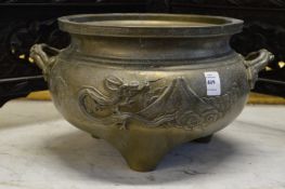 A good cast bronze Chinese twin handled censer.