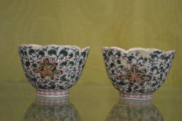A pair of small Chinese Famille Verte cups.