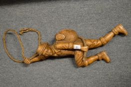 An unusual carved wood figure of a mountaineer.