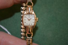 A ladies' Tudor 9ct gold cocktail watch.