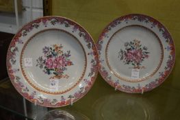 A pair of Chinese Famille Rose plates.