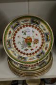 A set of six small Chinese plates.