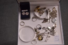 A collection of silver jewellery.