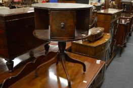 A revolving mahogany bookcase.