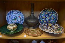 Eastern pottery and metalware.