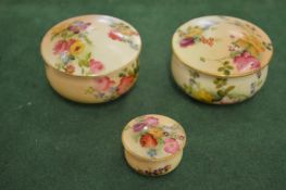 Three small Worcester blush ivory pots and covers.