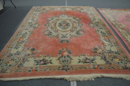 A large Chinese cream and pink ground carpet.