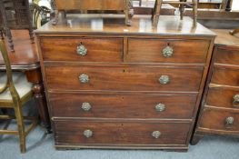 A George III mahogany chest of drawers.