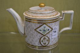 A French porcelain teapot.