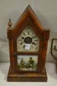 An American walnut cased mantle clock.