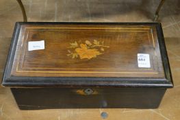 A Victorian small rosewood music box.