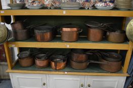 A comprehensive collection of 19th century copper saucepans, cooking pots, lids etc.