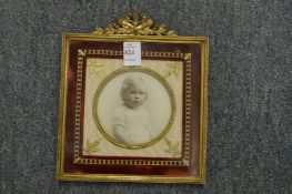A good ormolu and velvet photograph frame.