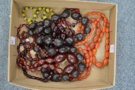 Bead necklaces, some possibly amber.