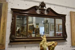 A good decorative overmantle mirror with broken arch pediment and basket of flower cresting.