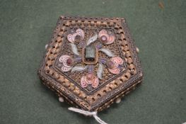 An eastern filigree box with inlaid decoration.