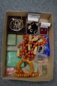 A quantity of jewellery, cigarette cases etc.