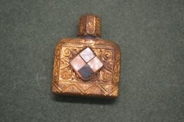 A decorative scent bottle.