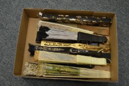 A quantity of decorative fans.