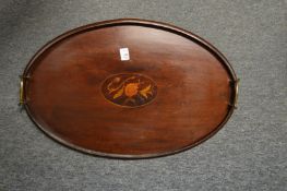 An Edwardian floral inlaid oval mahogany tray.