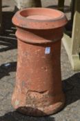 Two terracotta chimney pots.
