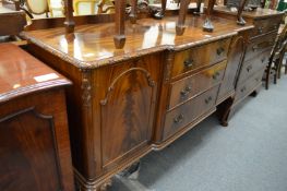 A Maple & Co Chippendale style mahogany sideboard.
