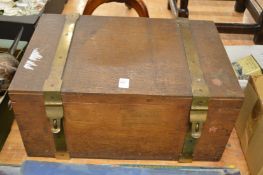 A brass bound oak box.