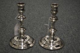 A good pair of silver candlesticks.