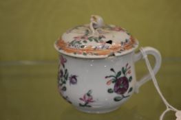 A Chinese Famille Rose cup and cover.