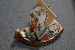 A Japanese Hirado porcelain model of a boat.
