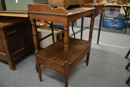 A Victorian mahogany two tier wash stand.