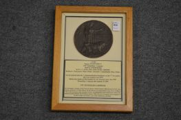 A framed and glazed WW1 bronze memorial death plaque or 