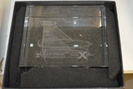 An etched glass presentation ornament.