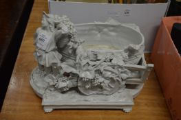 A decorative white glazed porcelain centrepiece (AF).