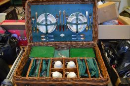 A good wicker hamper with contents, appears little or unused.