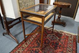 A Sheraton revival cross-banded mahogany bijouterie table.