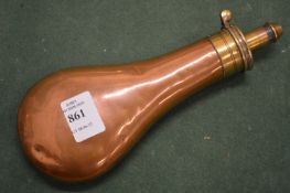 A copper powder flask.