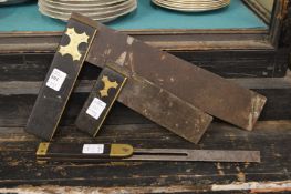 Three brass bound ebony handled wood working tools.