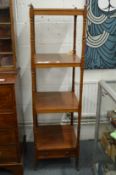 A 19th century mahogany four tier what-not with a drawer to the base.